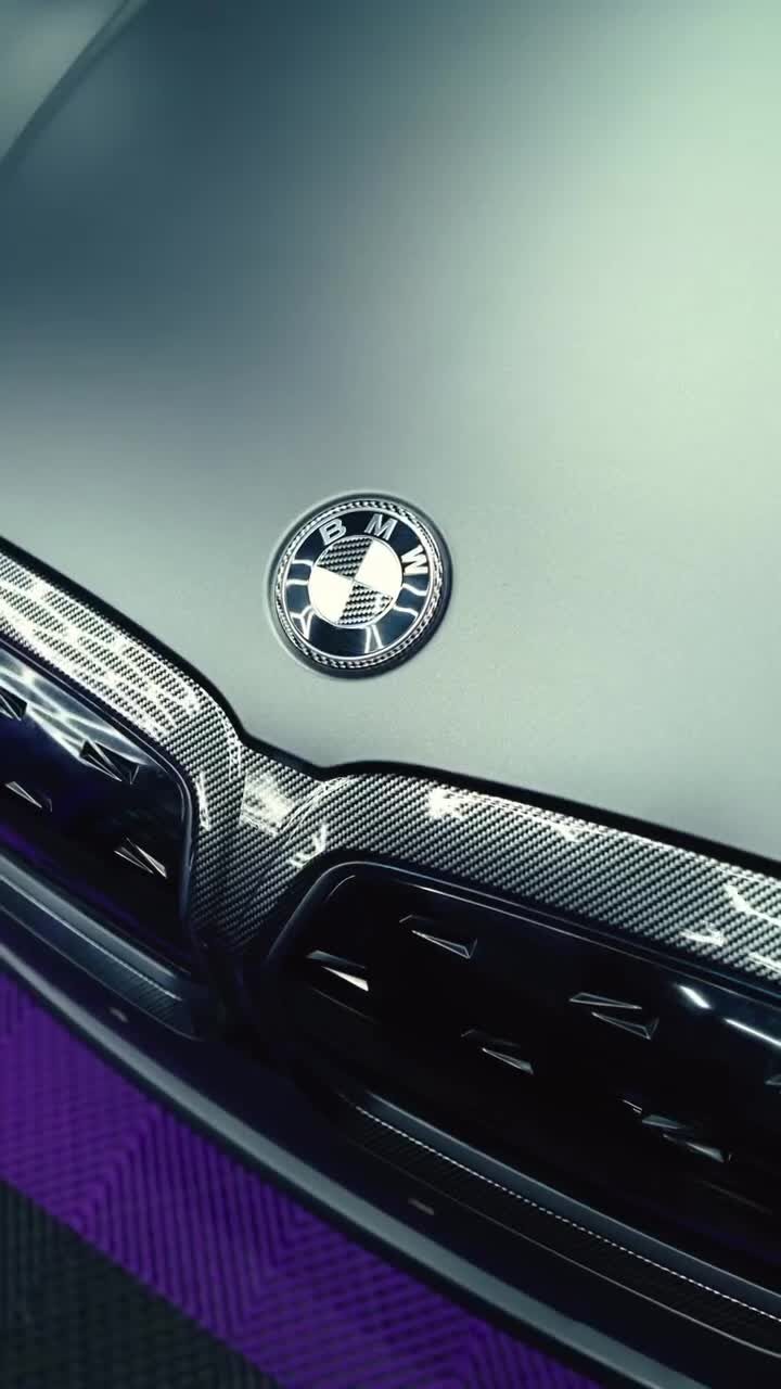 Close view of a BMW grille and badge