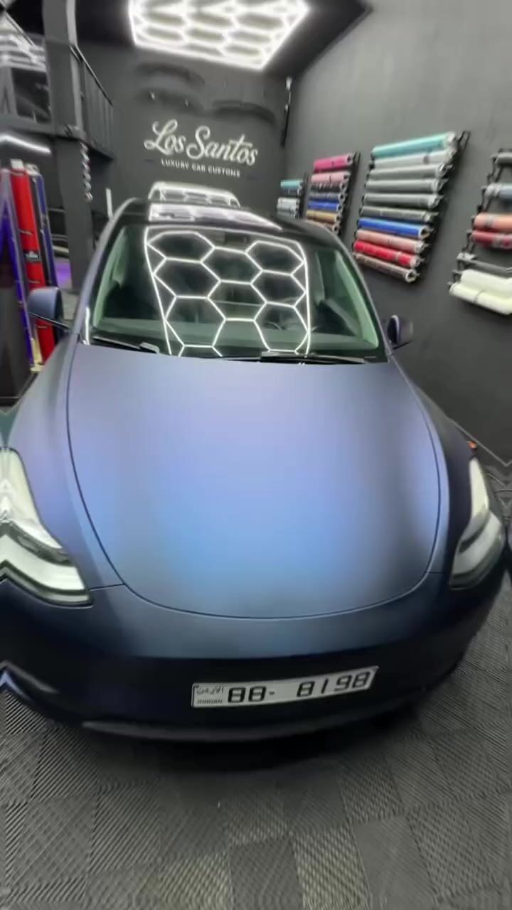 Front view of a Tesla inside the Los Santos studio